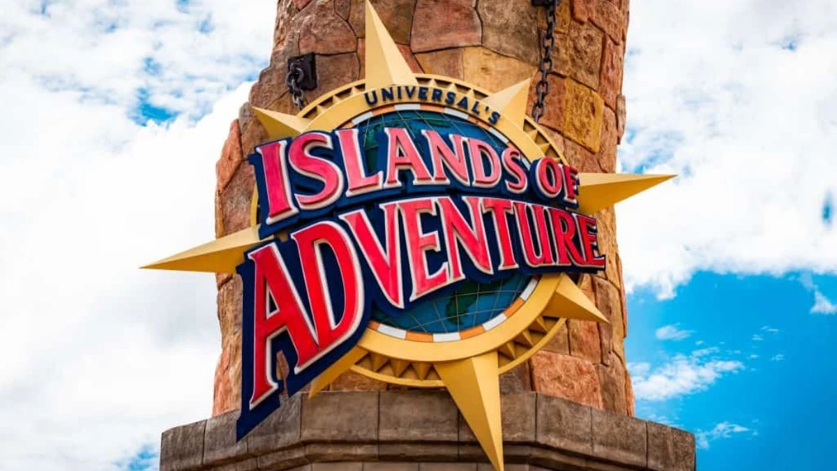 Signage for Universal's Islands of Adventure featuring bold red letters and a globe