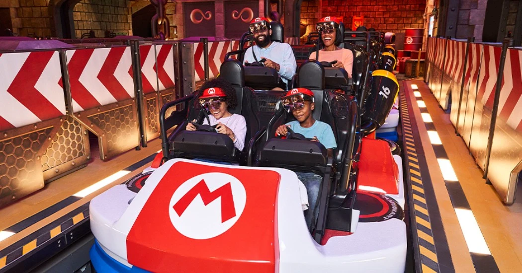 A Mario Kart ride with excited passengers