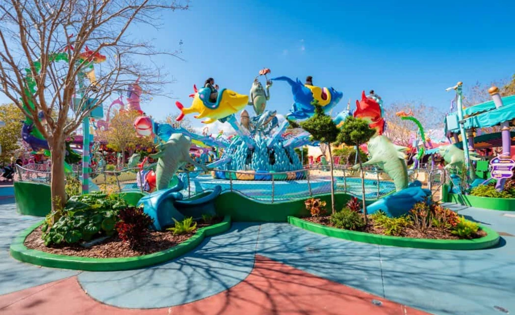 Colorful playground with dolphins and rides