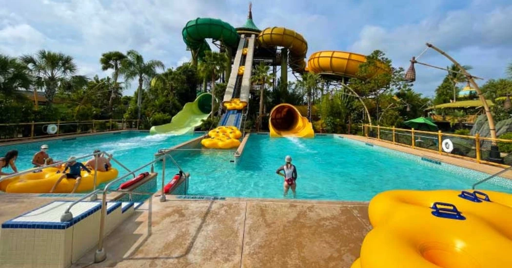 High-speed raft slide with drops and dark tunnels