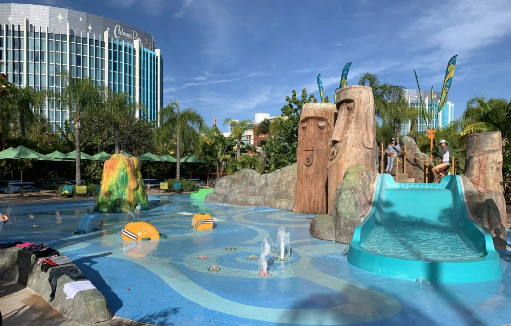 Colorful water play area with slides and sprays