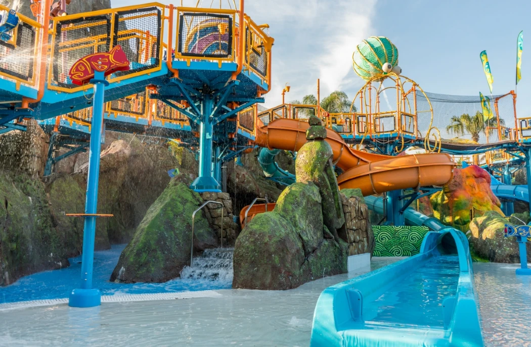 Tiki-themed water play area for toddlers