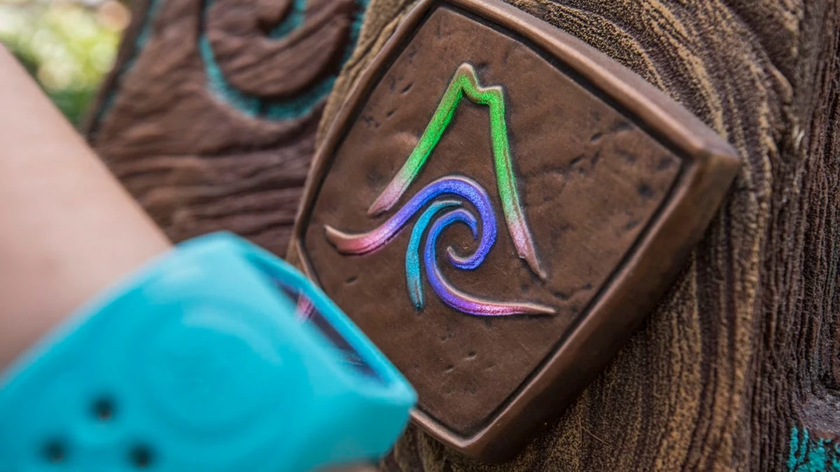 TapuTapu wristband for tapping on the Volcano Bay sign